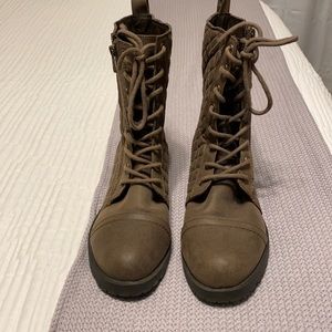 Brown combats boots, size 11 women’s.